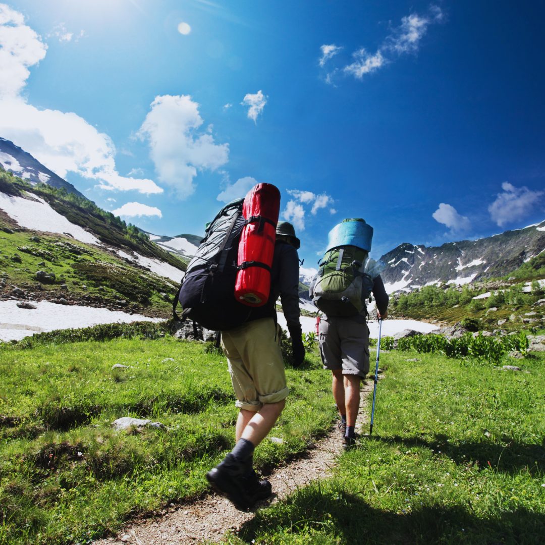 a group of people hiking on a mountain